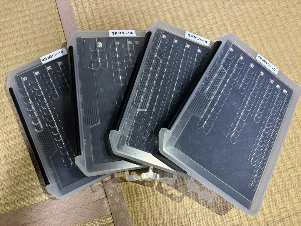 Gamakatsu treble hooks organized by size and type in a Meiho Slit Foam Case